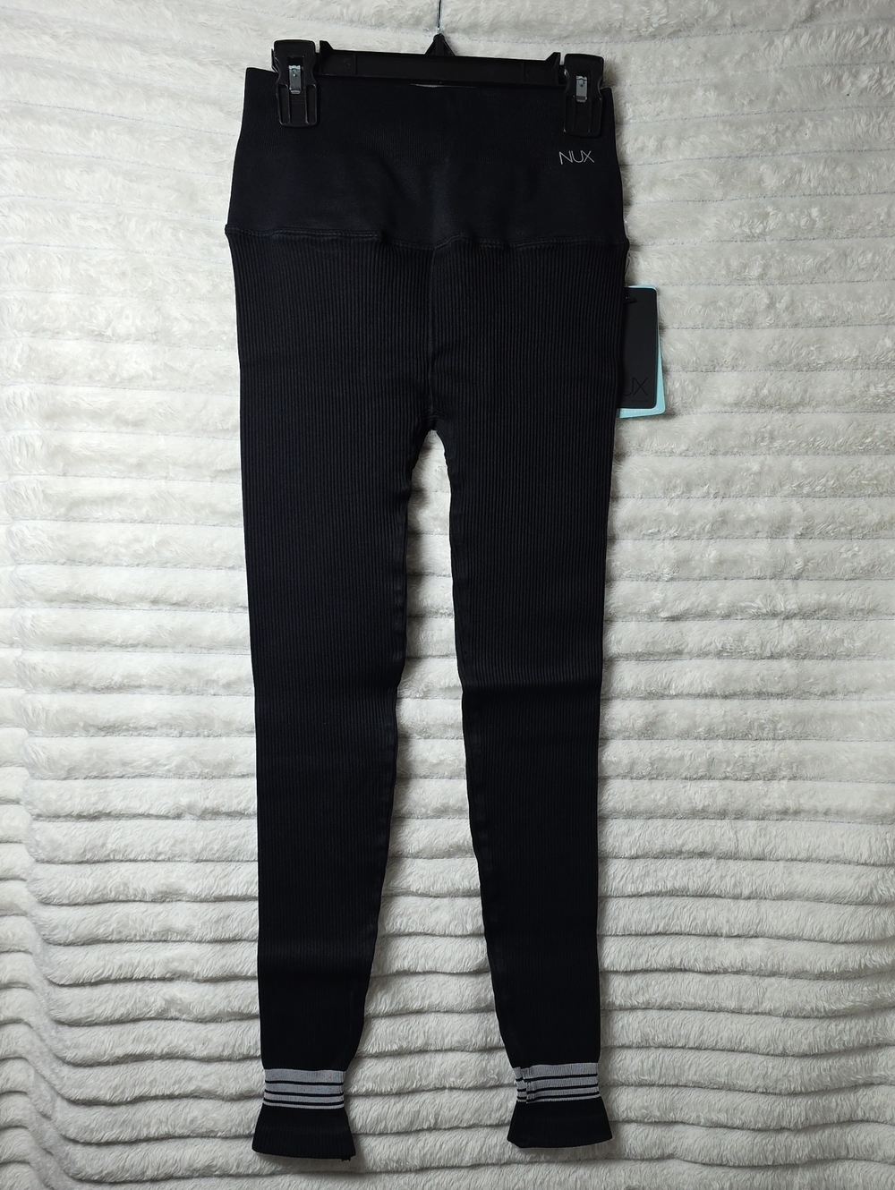 0604 Nux high-waisted ribbed leggings featuring unique striped ankle detailing